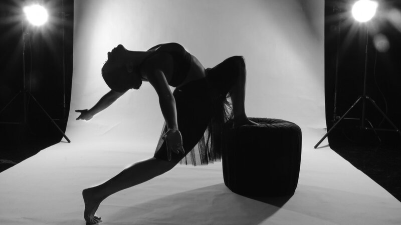 dancer in silhouette pose