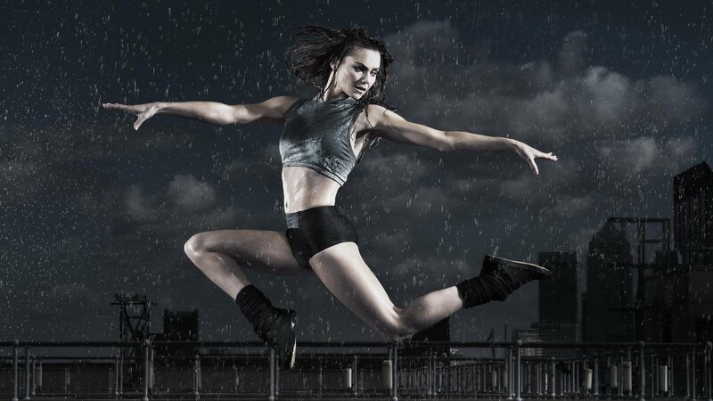 dancer jumping in the rain