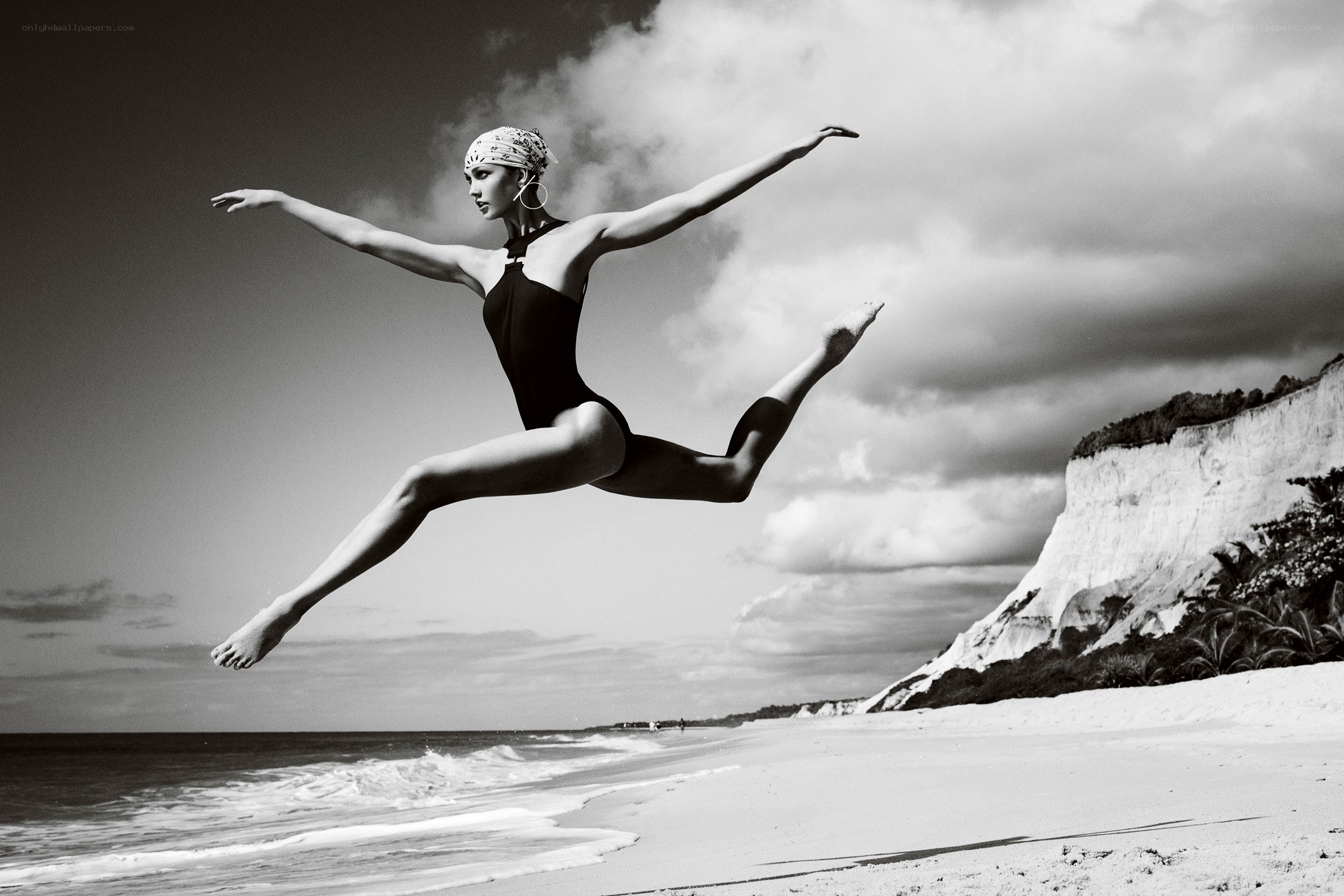 dancer leaping on beach