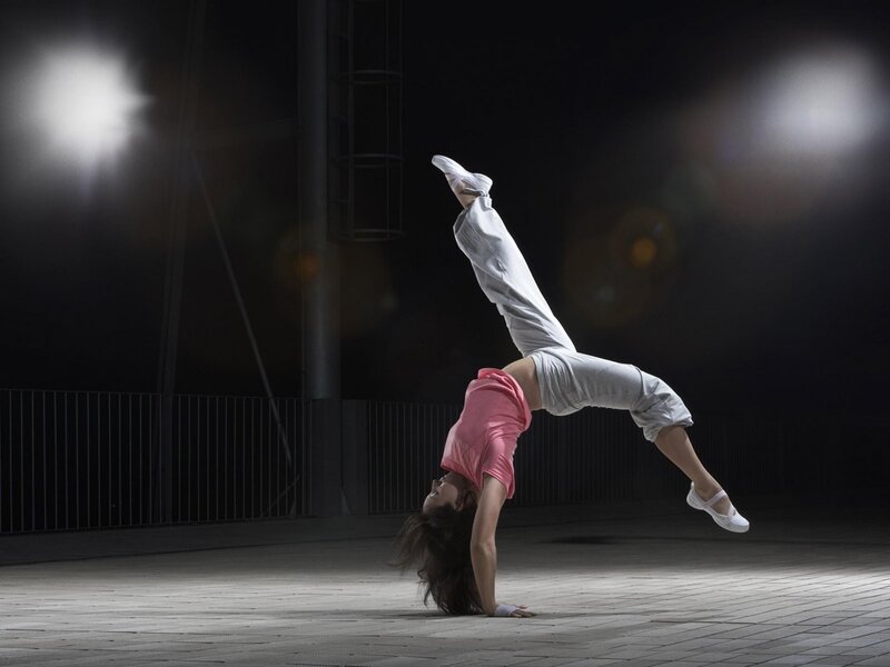 Dancer performing handstand