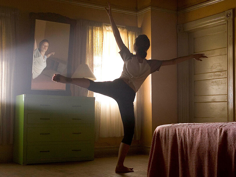Dancer practicing in bedroom