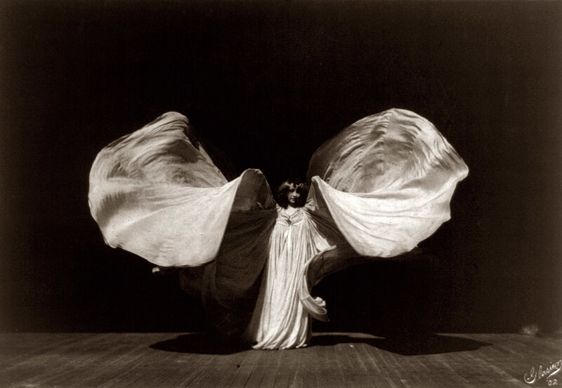 Dancer with flowing fabric
