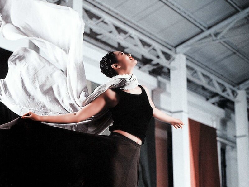Dancer with flowing white fabric