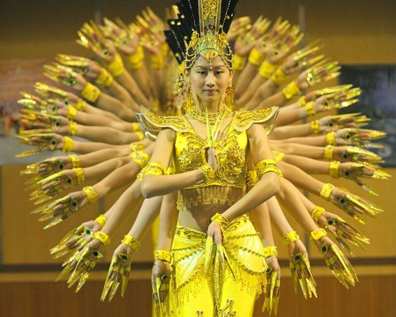 Dancer with multiple arms