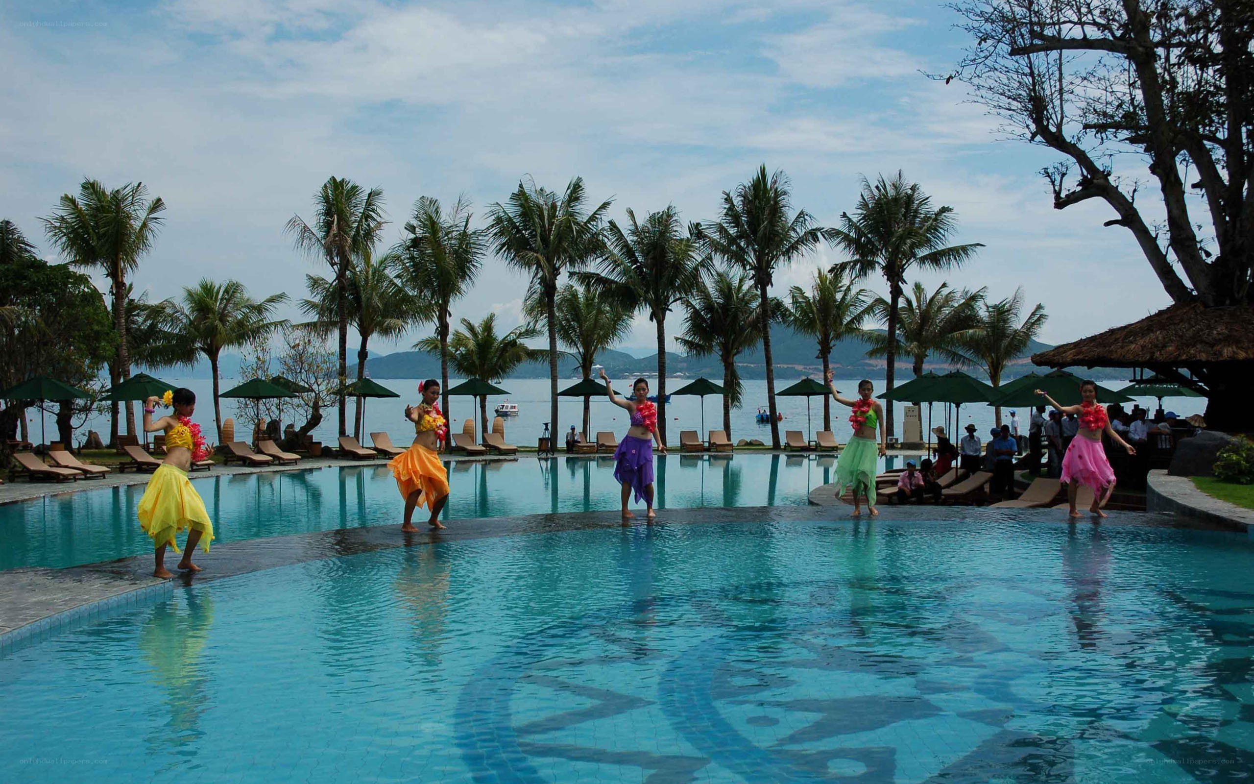 Dancers at poolside resort