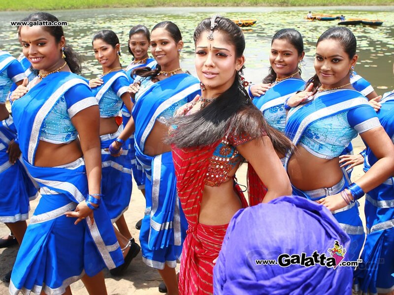 dancers by a lake