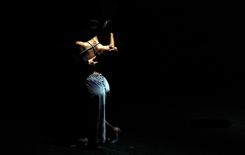 Dancers in a dark embrace