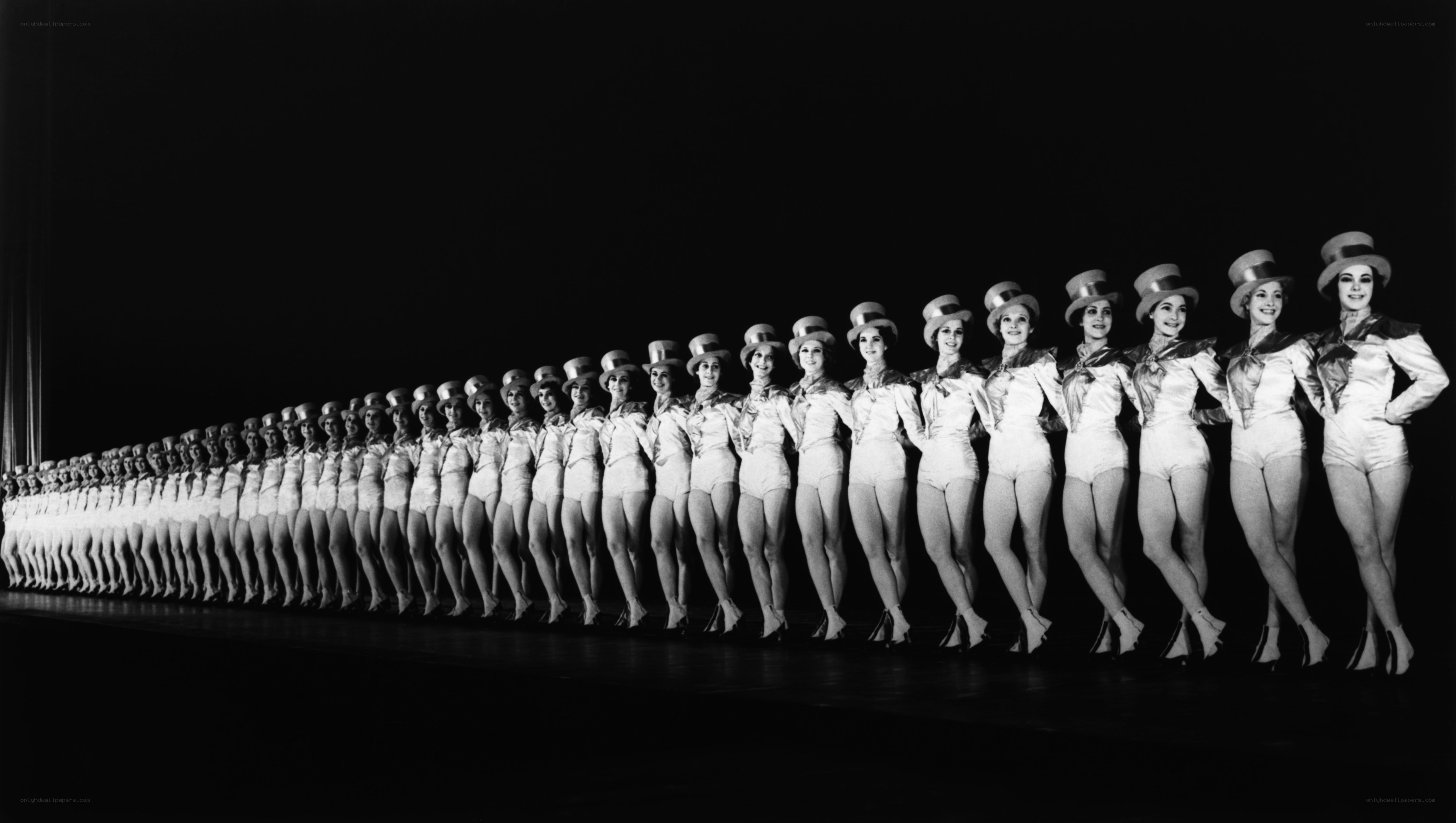 Dancers in a line on stage