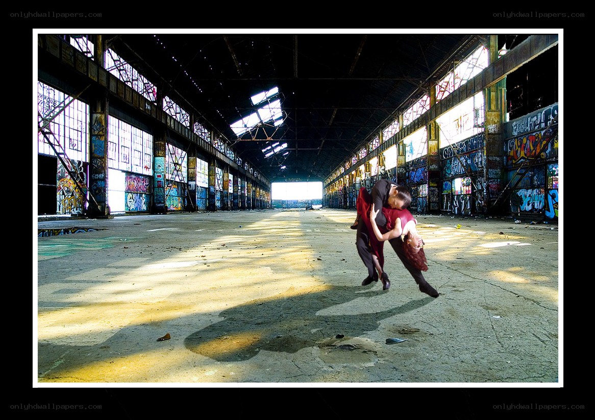 Dancers in an abandoned warehouse