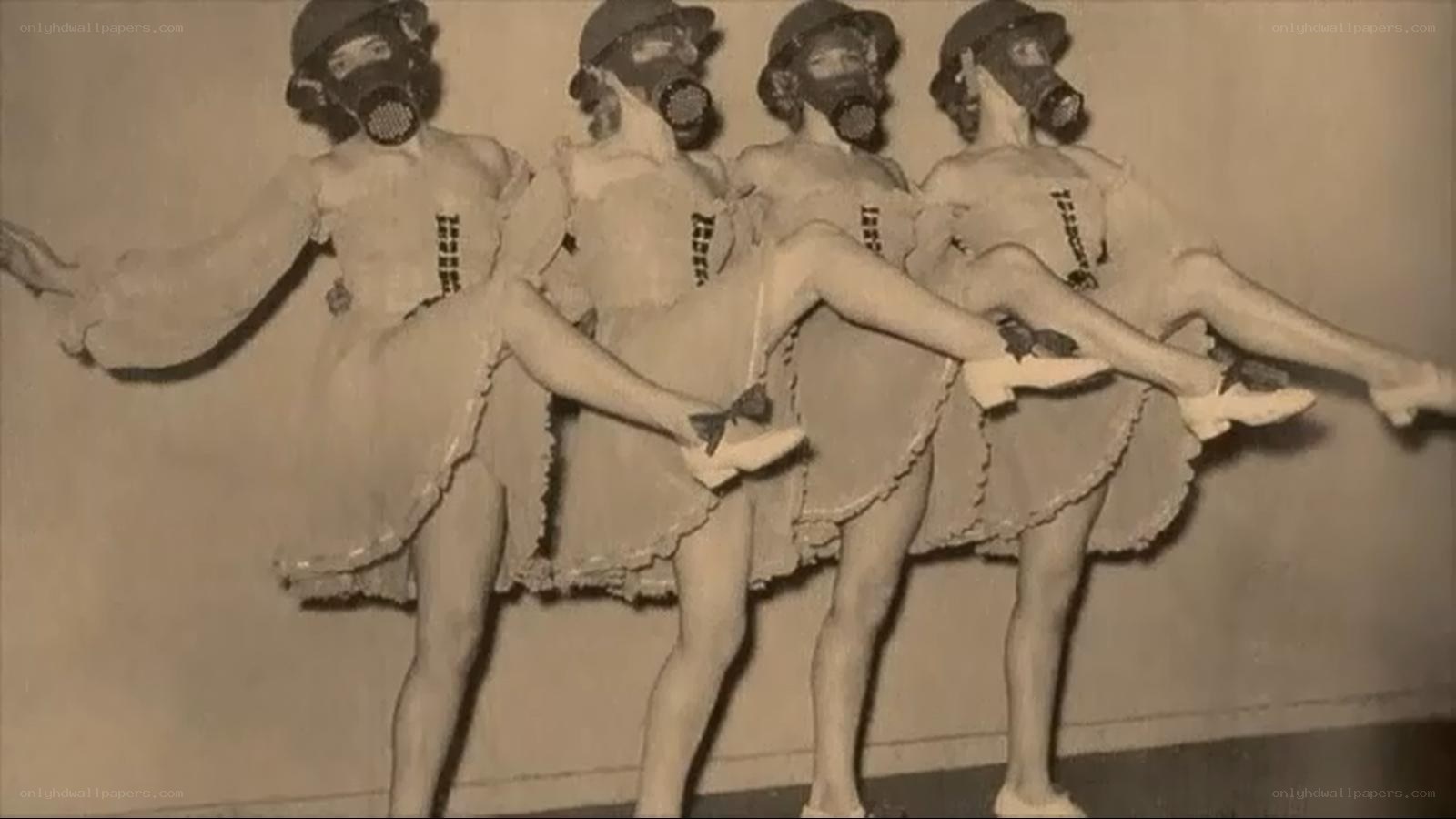 dancers in gas masks