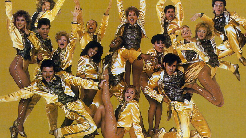 Dancers in Gold Suits