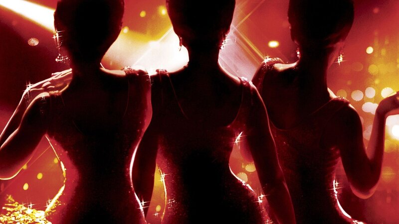 dancers in red light