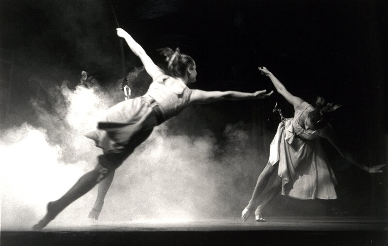 Dancers in smoke on stage