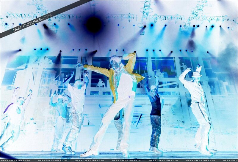 Dancers on a lit stage
