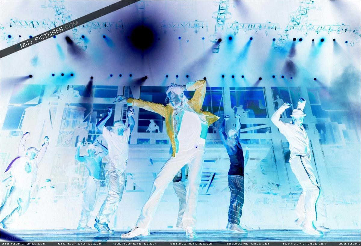 Dancers on a lit stage