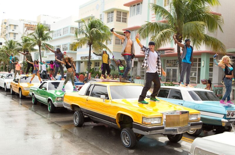 Dancers on classic cars in Miami