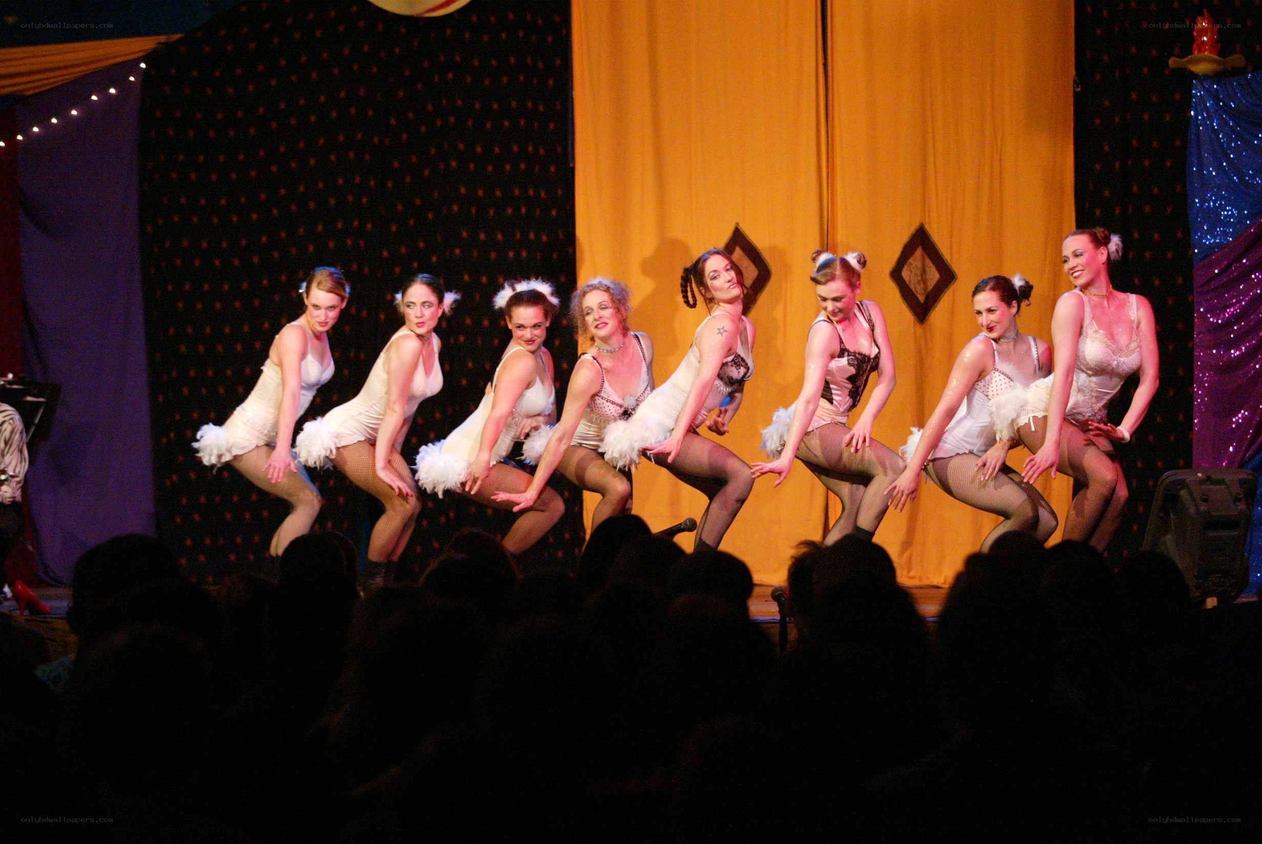 dancers on stage in performance