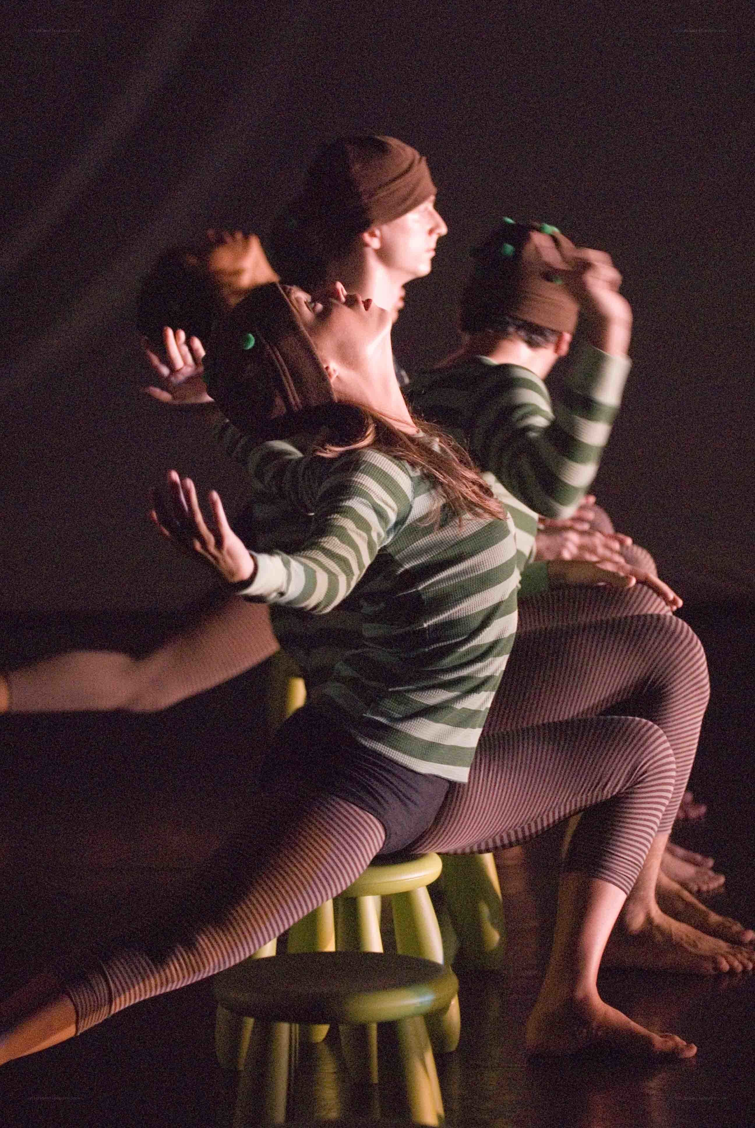 Dancers on stools in performance