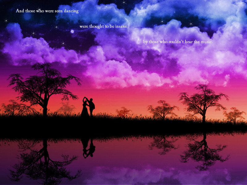 Dancing couple at sunset
