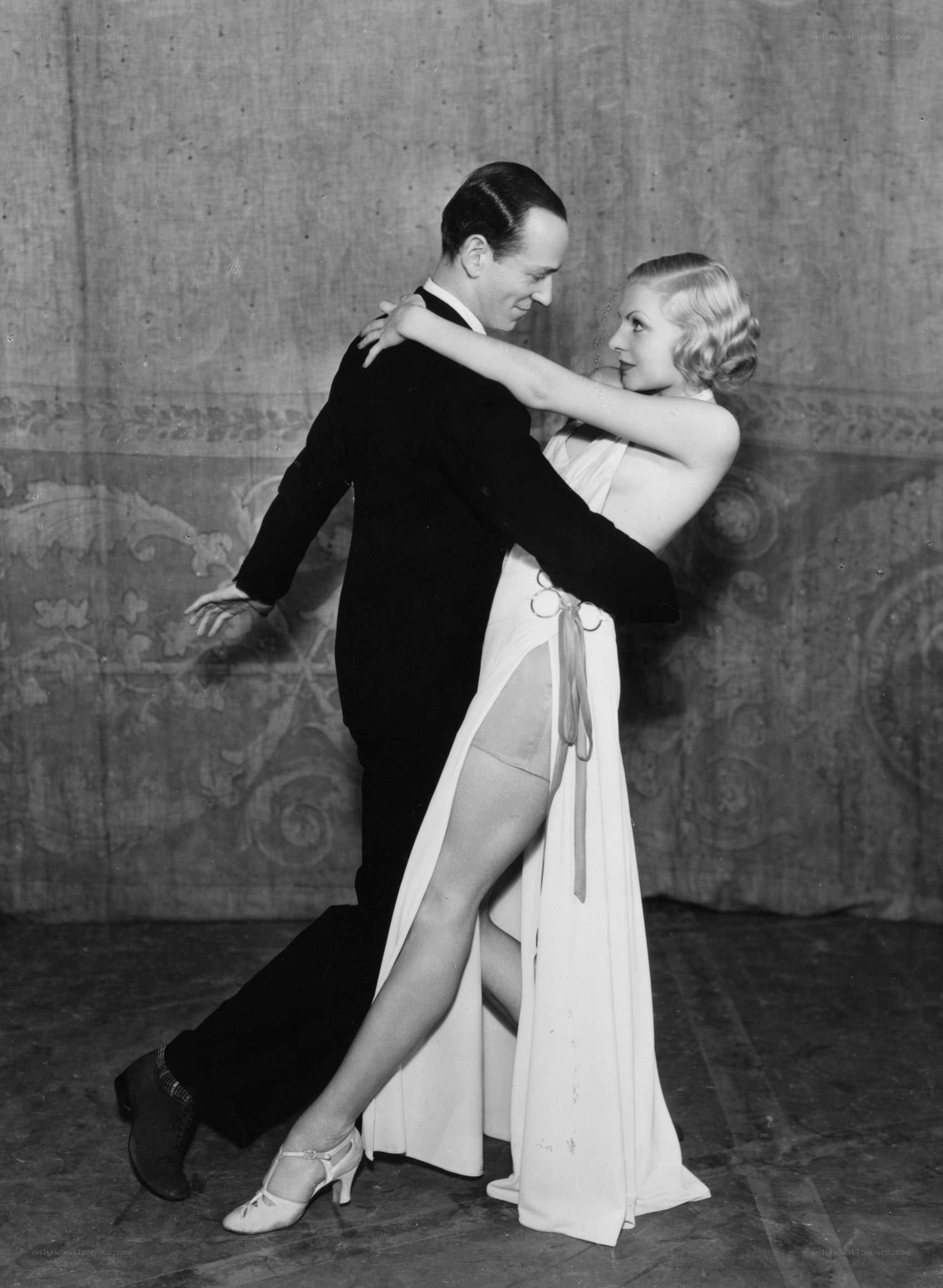 Dancing couple in formal wear