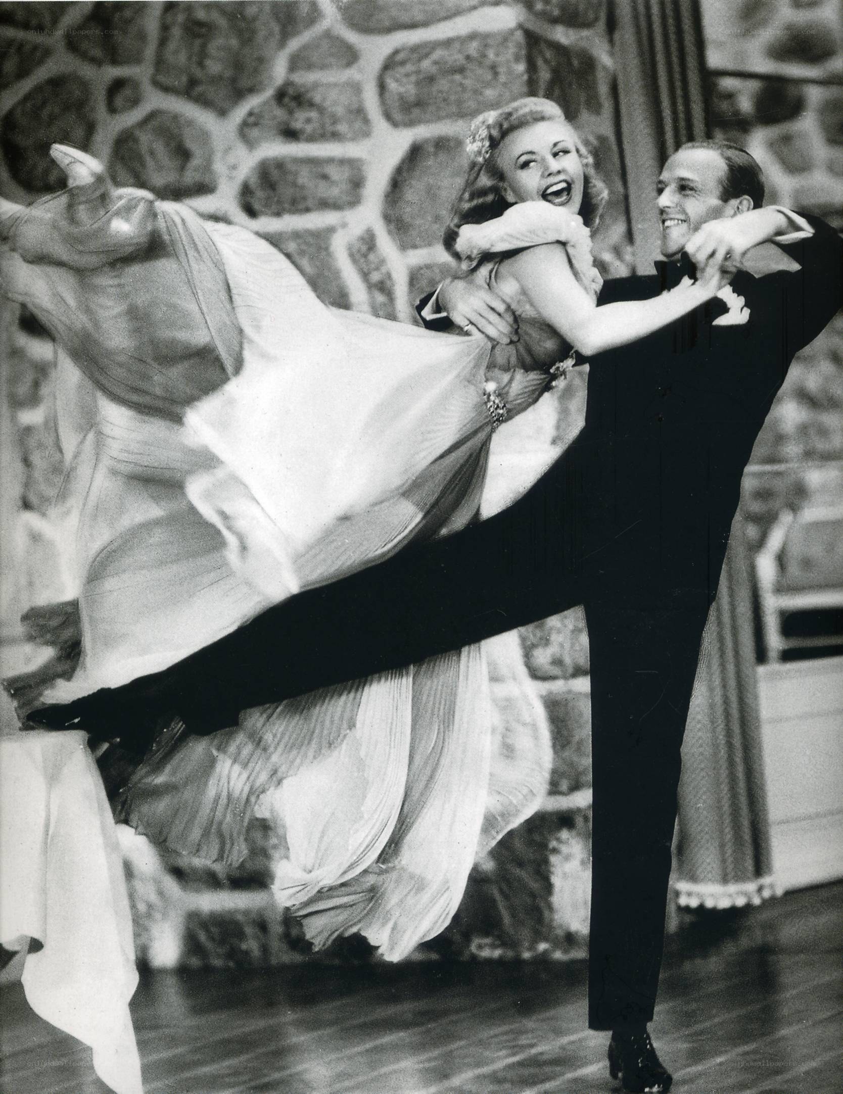 Dancing couple in formal wear