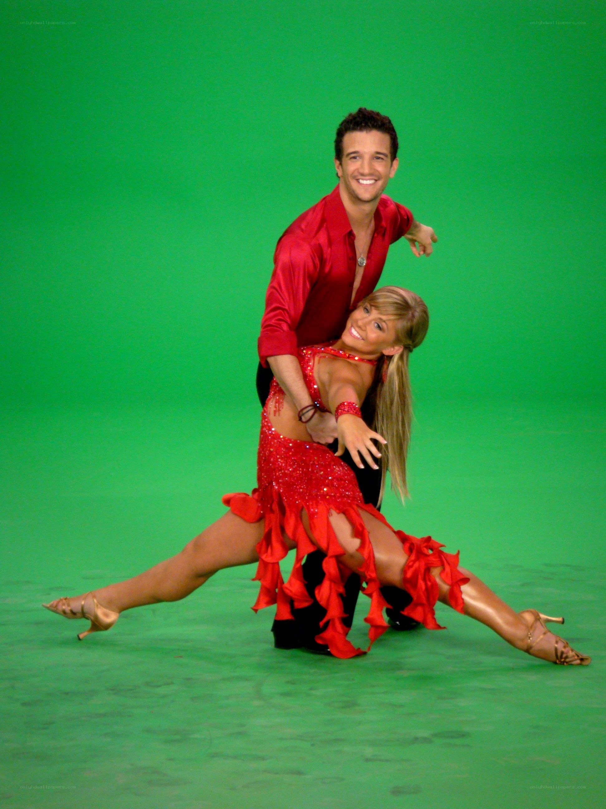 Dancing couple in red costumes