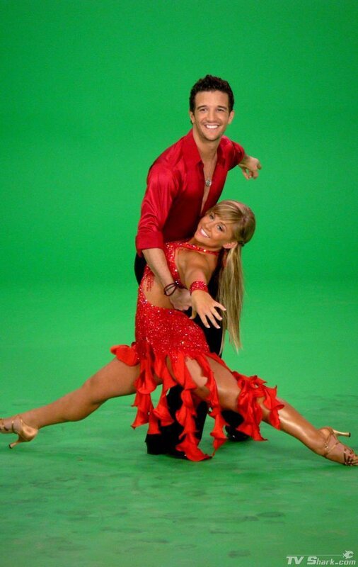 Dancing couple in red costumes