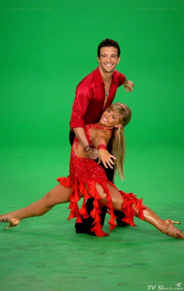 Dancing couple in red costumes