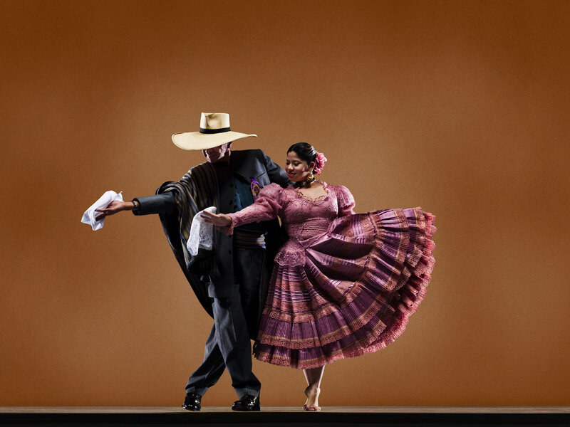 Dancing Couple in Traditional Attire — Brown