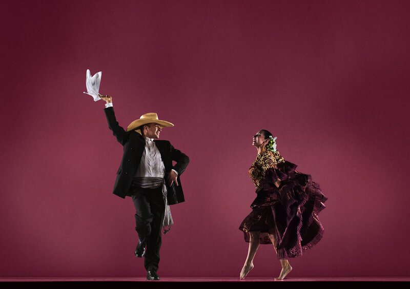Dancing Couple in Traditional Attire — Maroon