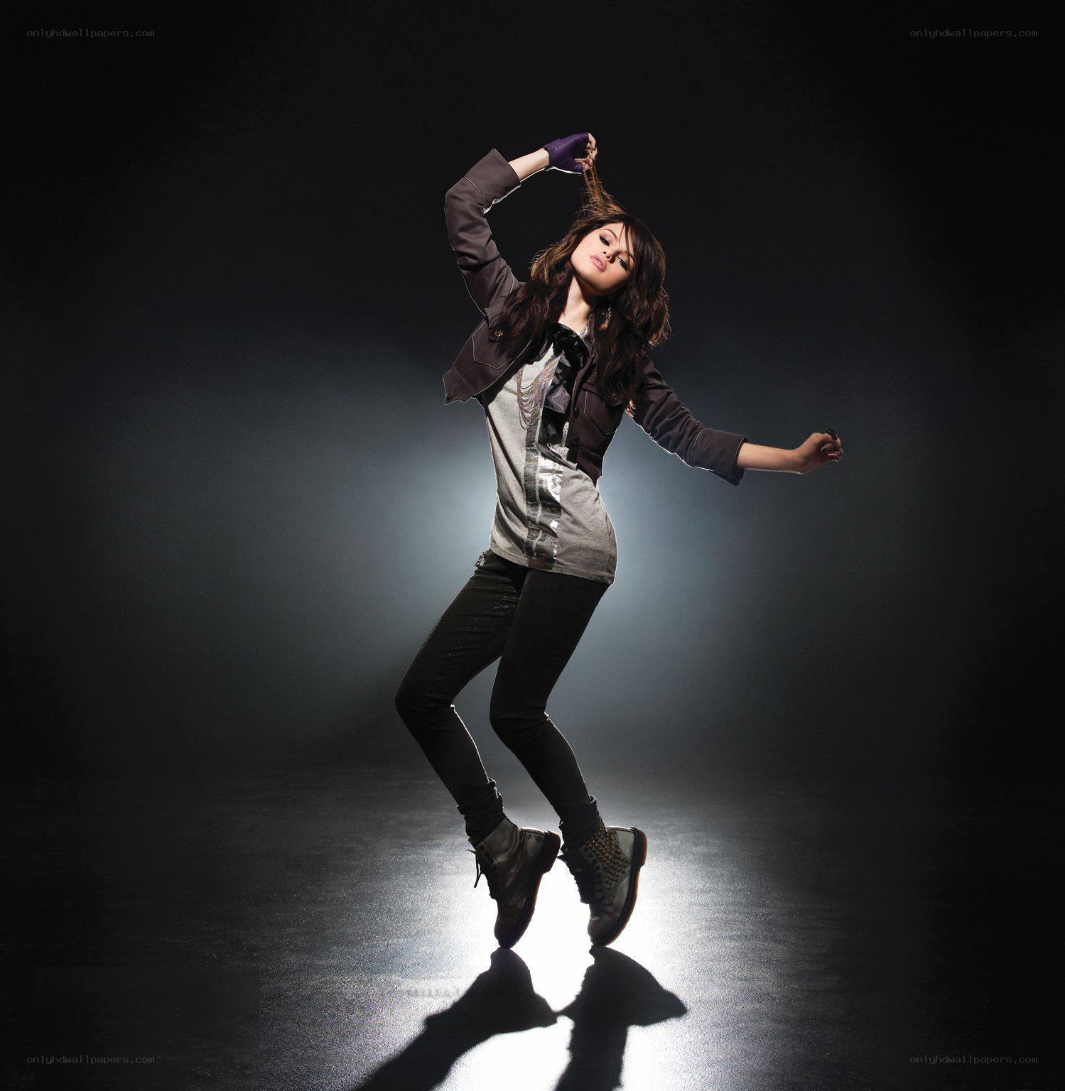 dancing woman in dark jacket
