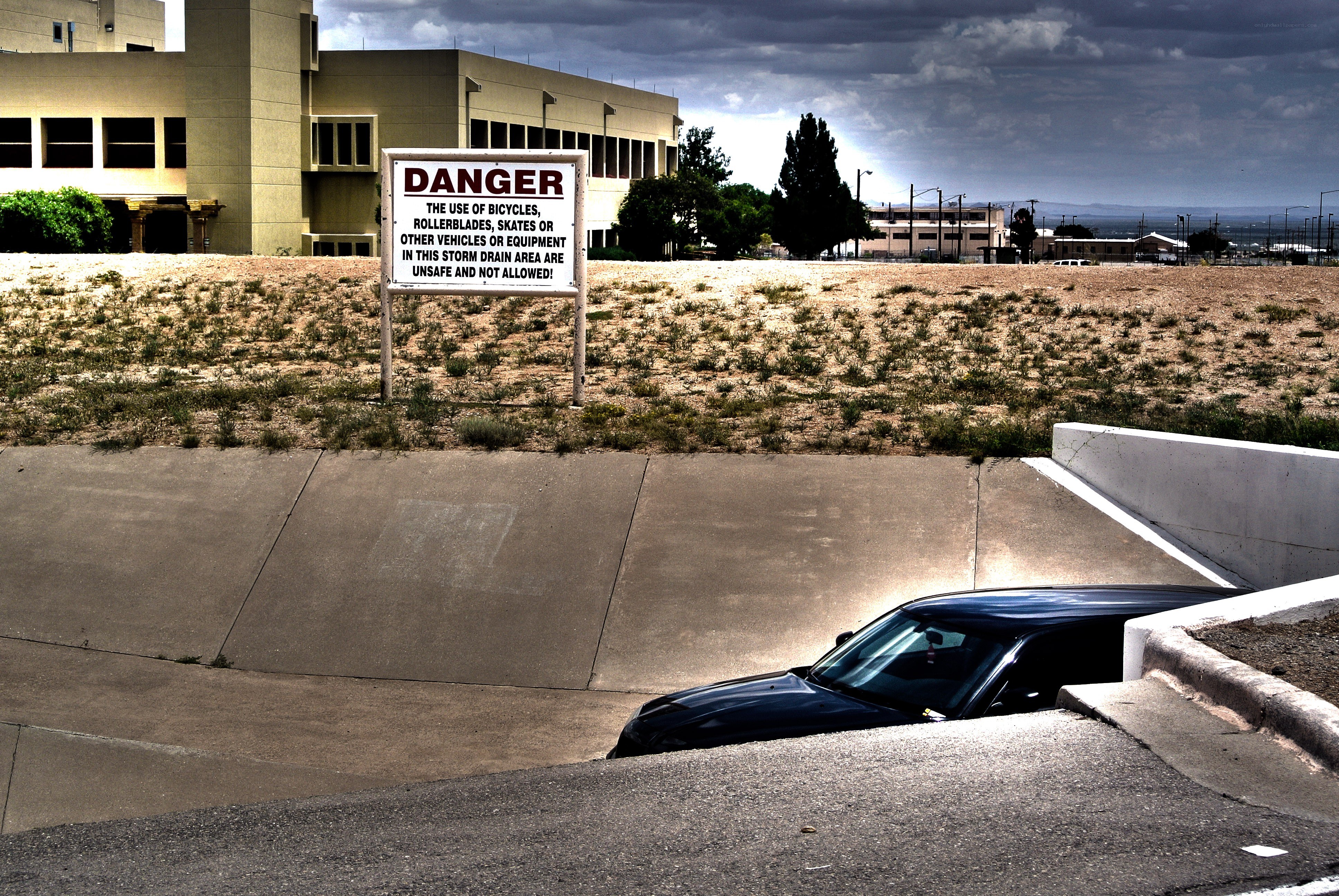 Danger sign near storm drain