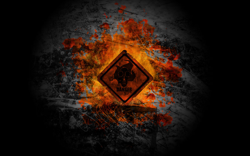 Danger sign with fire background