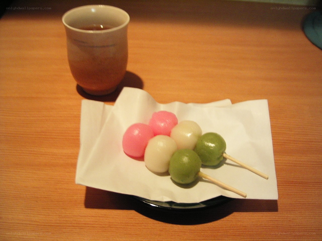 Dango and tea on a wooden table