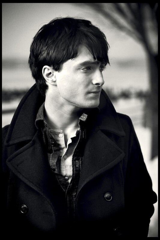 Daniel Radcliffe in a black coat