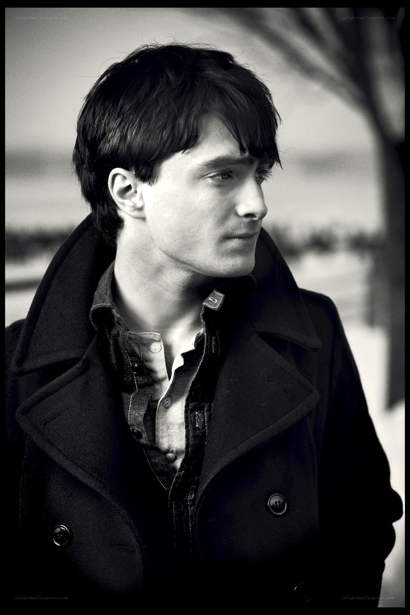 Daniel Radcliffe in a black coat