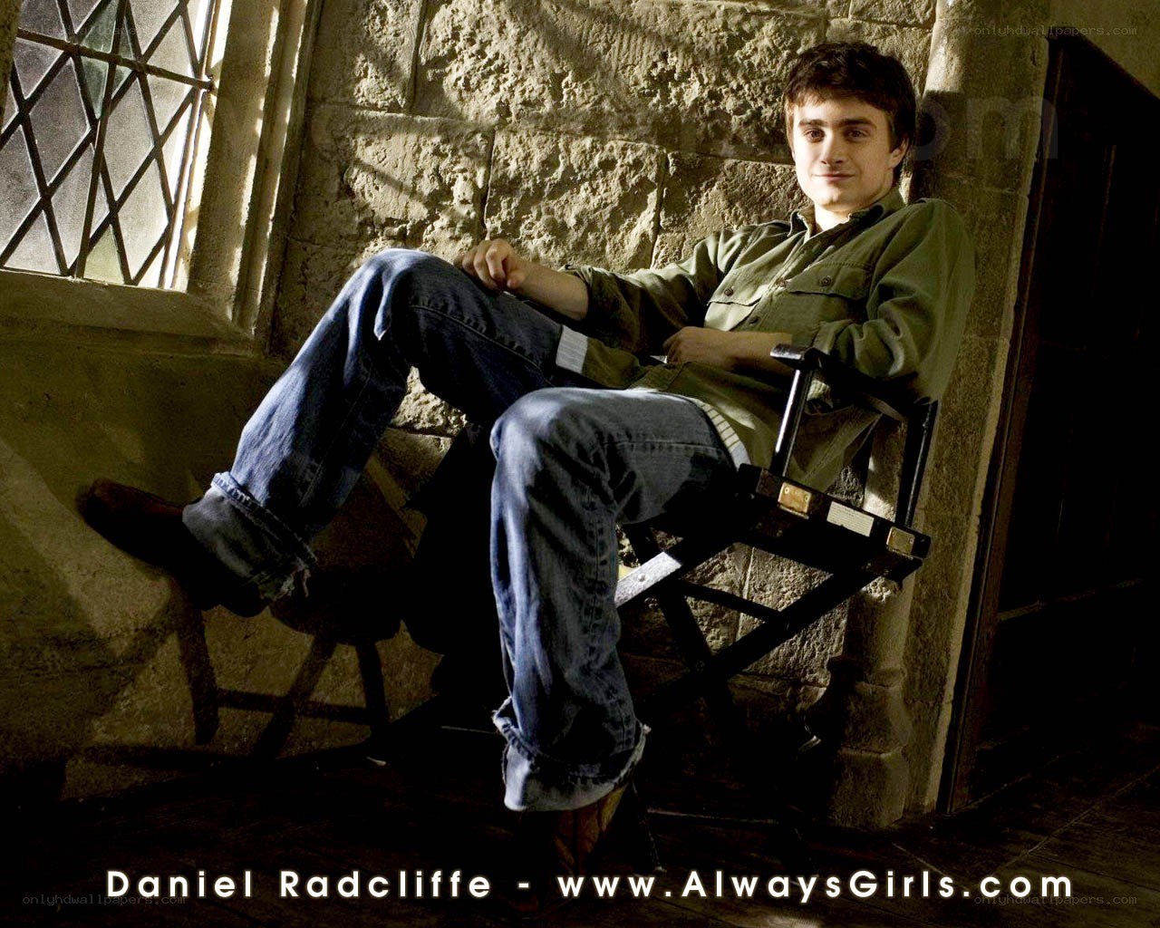 Daniel Radcliffe in a chair