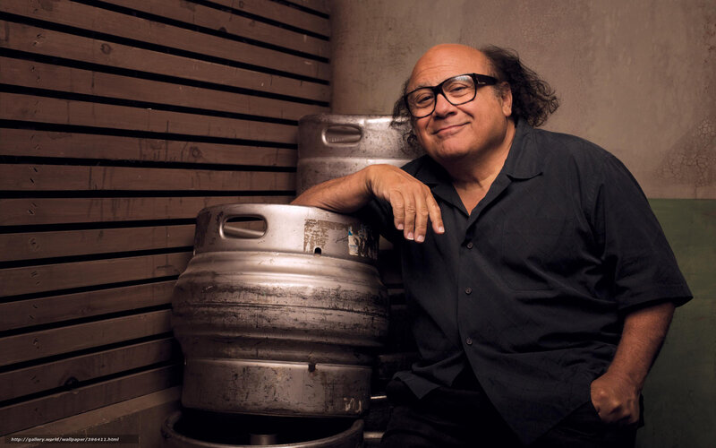 Danny DeVito with beer kegs