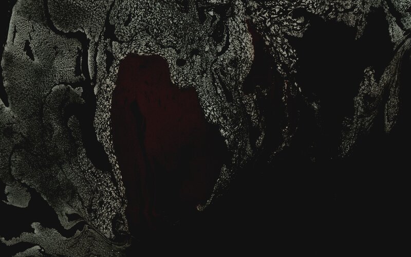 dark abstract texture with red center