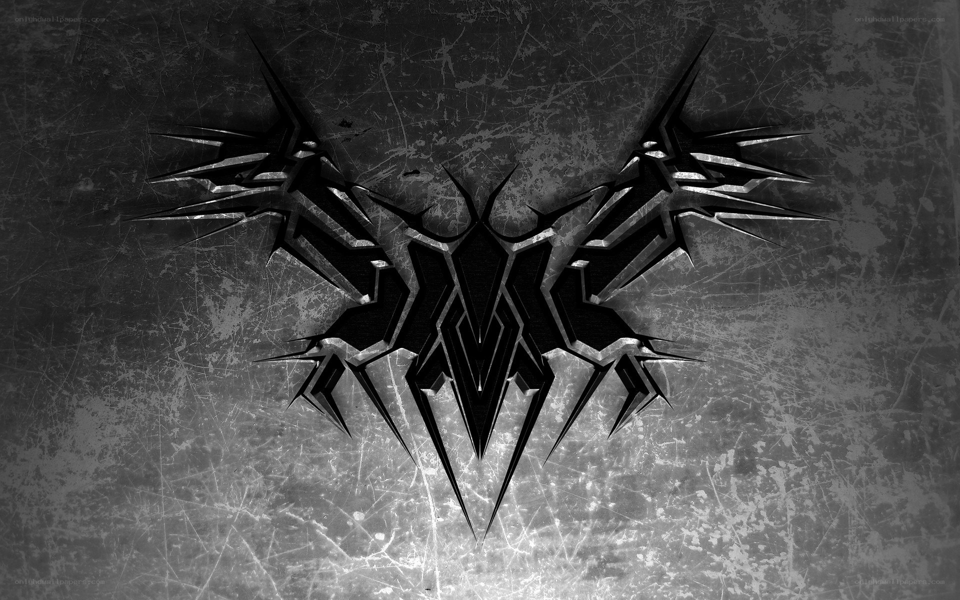 dark abstract winged emblem