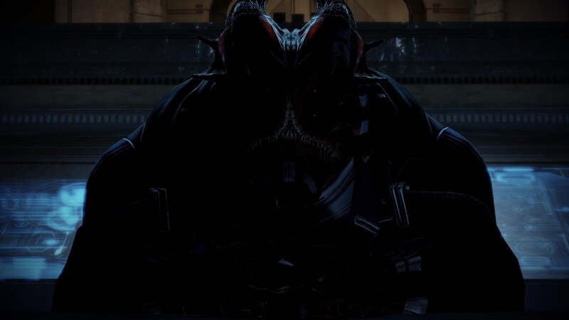 dark alien figure in dim light