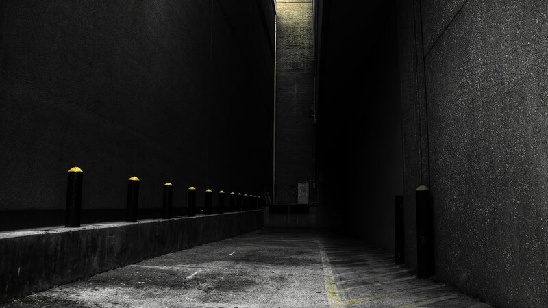 Dark Alley with Bollards — Black, Dramatic