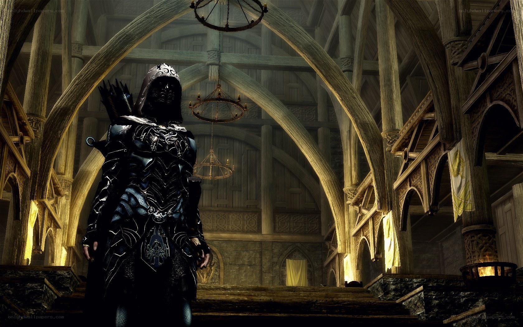 dark armored figure in hall
