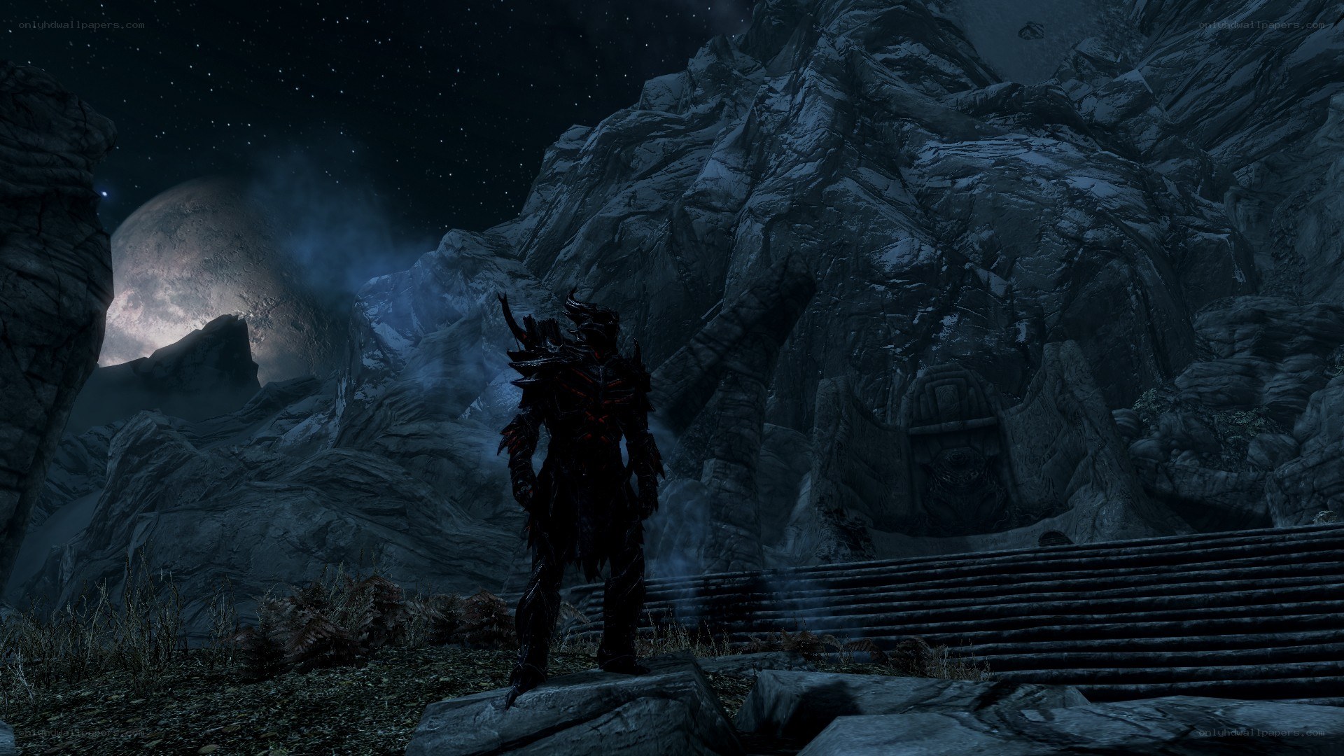 dark armored figure in mountain pass