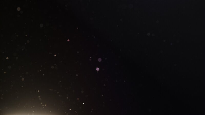 dark background with floating particles