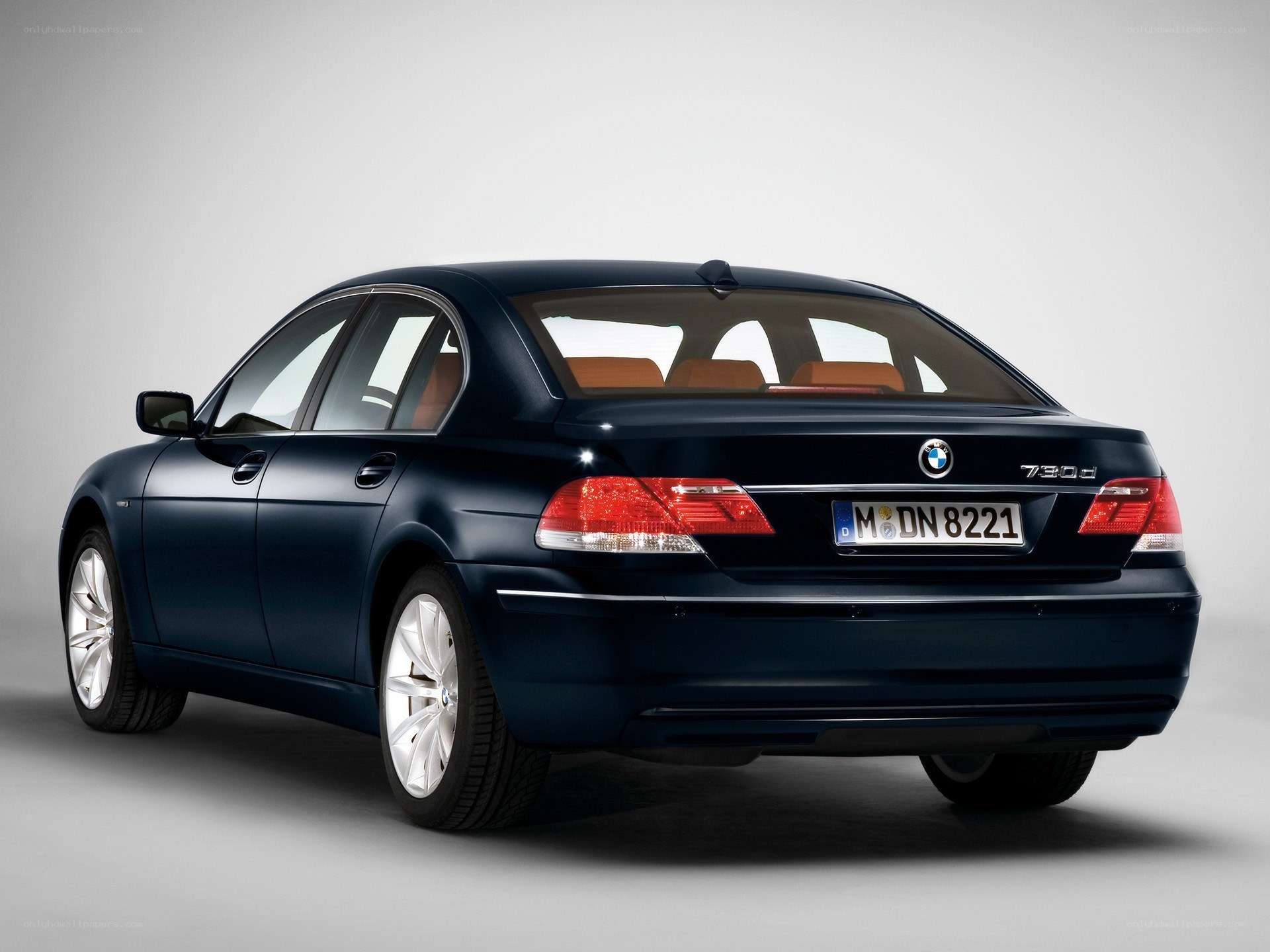 Dark blue BMW 730d sedan