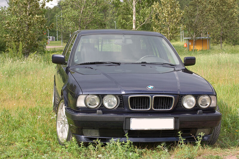 Dark Blue BMW Sedan — Calm