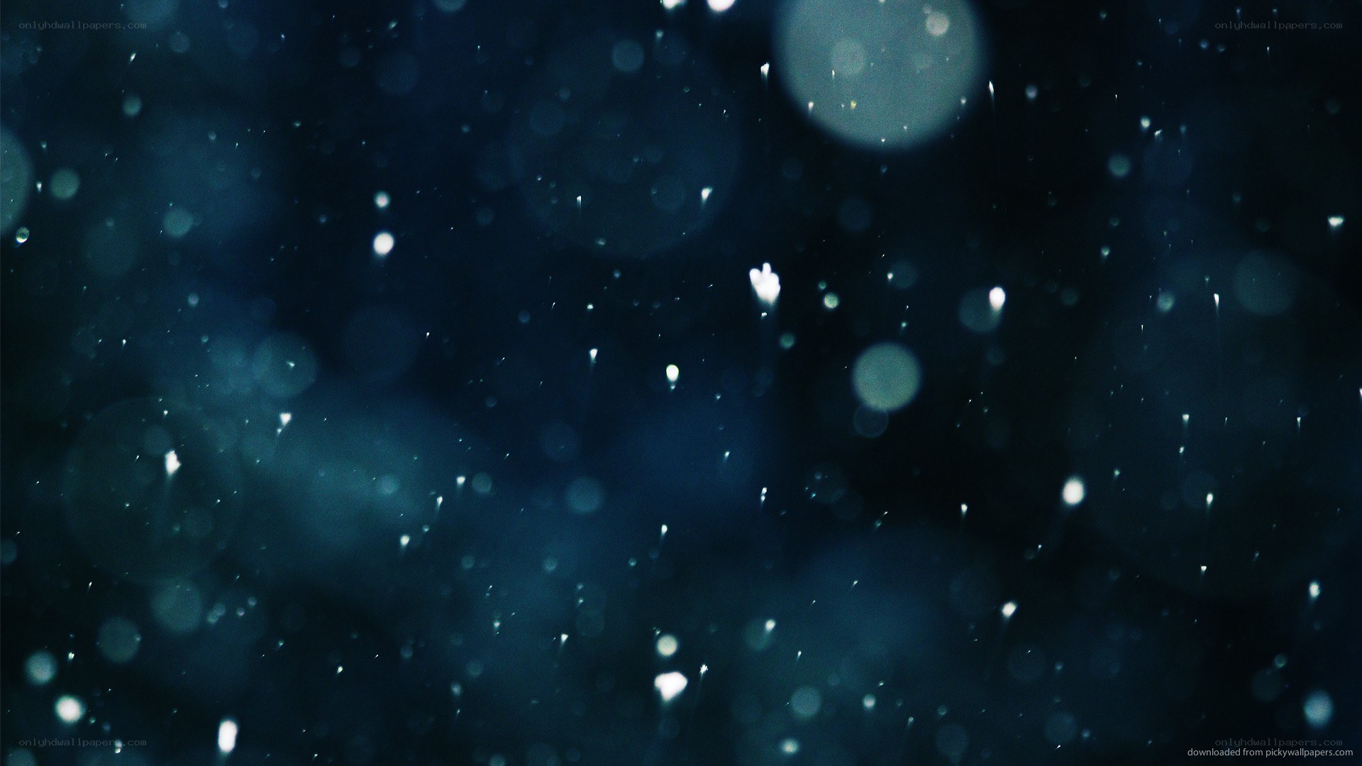 dark blue bokeh with particles