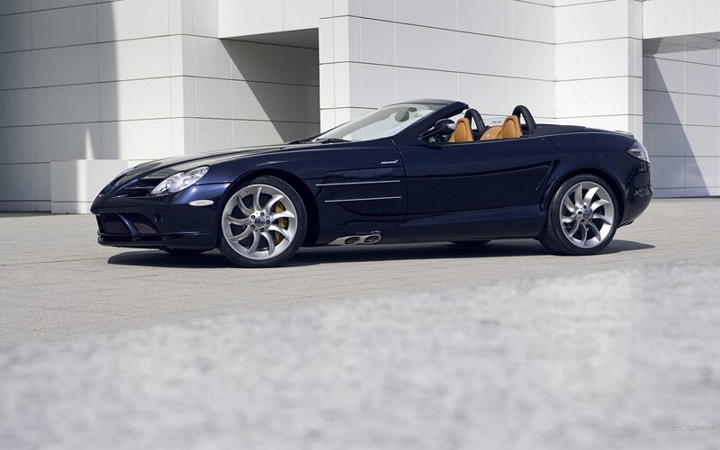 dark blue convertible sports car