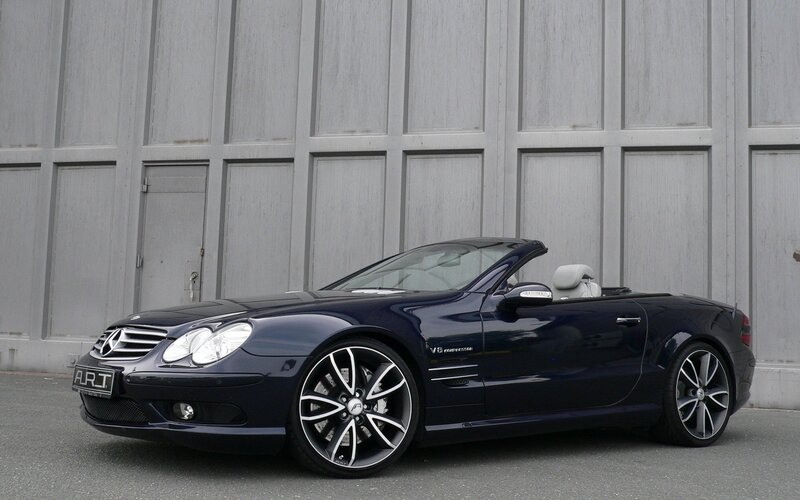 dark blue convertible sports car